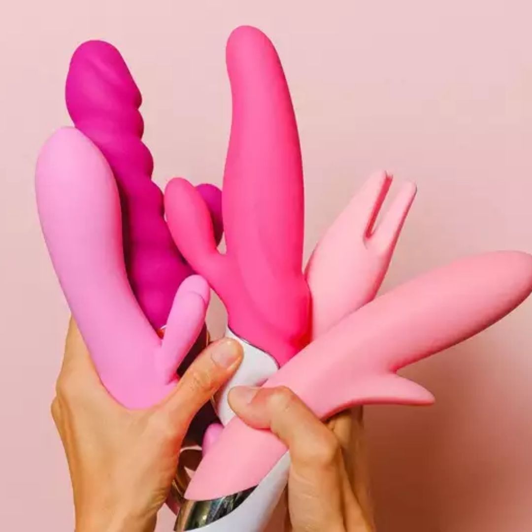 Different types of sex toys pink and purple